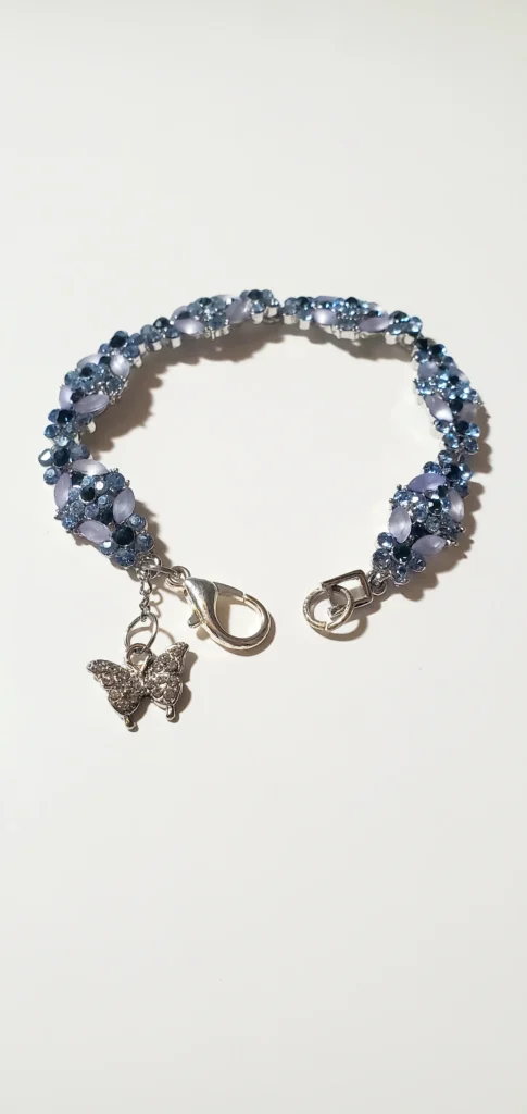 Beautiful Pale Blue Bracelet With Silver Butterfly
